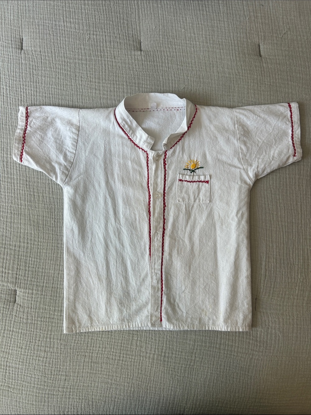 Festive Kids Short-Sleeve Top with Red Trim and Sun Pocket Embroidery